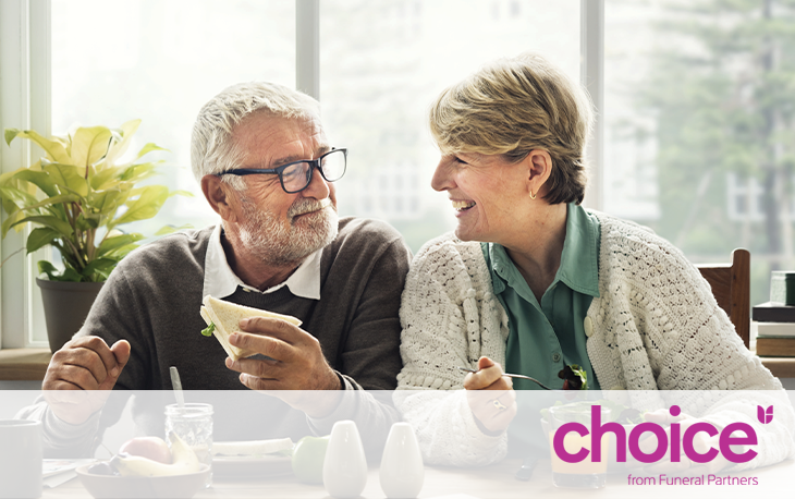 An elderly man and woman enjoying lunch. Caption: Choice, from Funeral Partners